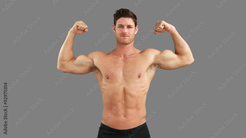 Muscular man flexing his muscles Muscular man flexing his muscles