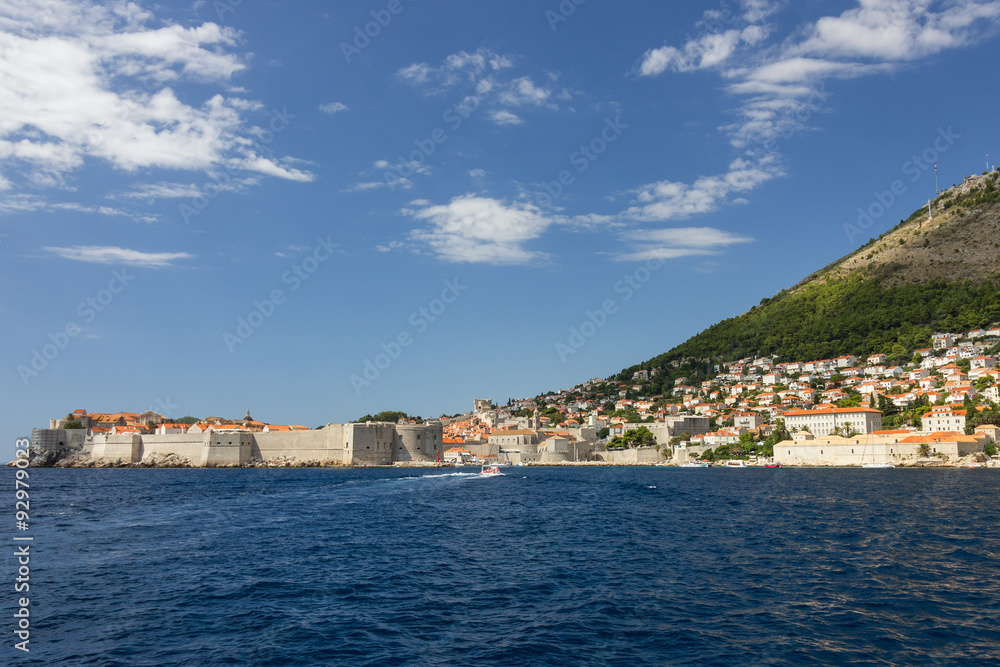 View of the City Walls, city of Dubrovnik and Mount Srd from the sea in Croatia. Copy space.