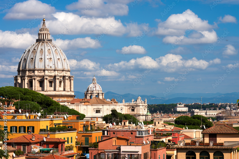 St.Peter and roofs of Rome