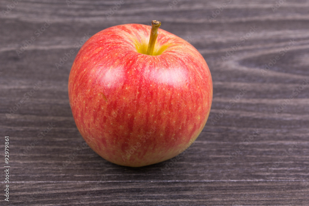 Apple red on a table Apple red on a table