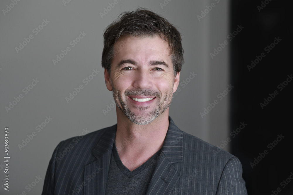 Obraz premium Close up OF A Mature Man Smiling At The Camera