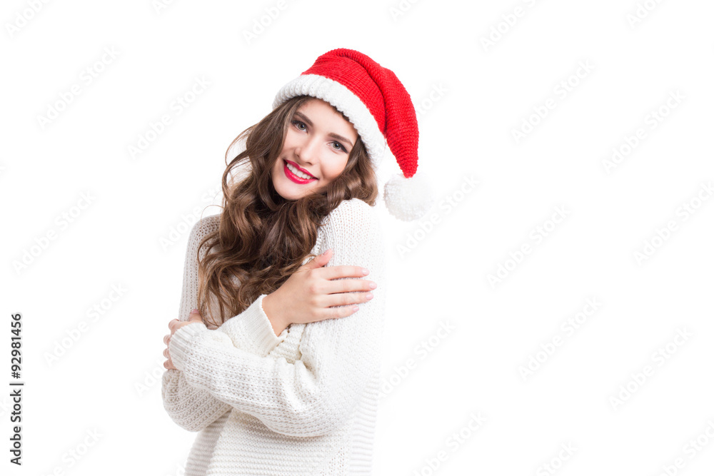 Portrait of a beautiful woman in santa hat with long curly hair. Portrait of a beautiful woman in santa hat with long curly hair.