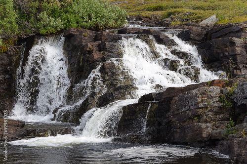 Beautiful waterfall on small river