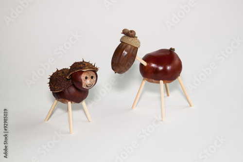 isolated creative handmade toys made of chestnuts and acorn  © lukasx
