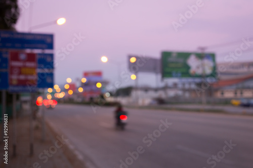 car driving on road with traffic jam in the city, abstract blur