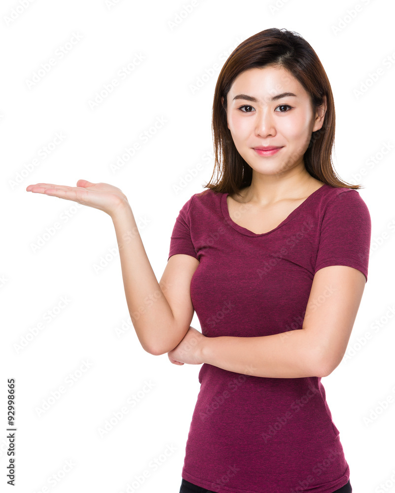 Asian young woman with hand showing blank sign Asian young woman with hand showing blank sign