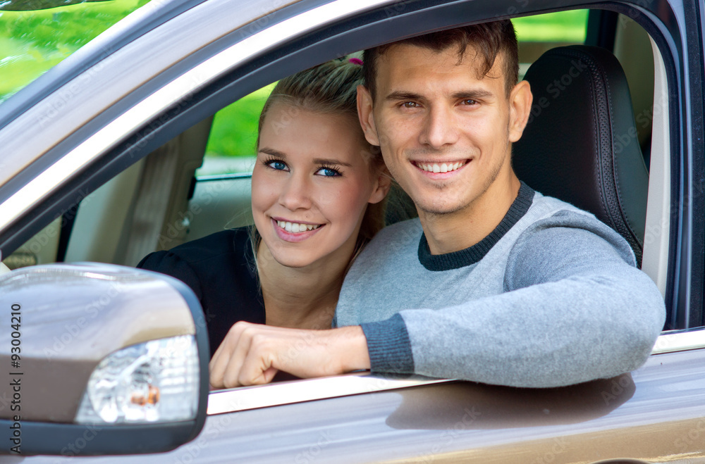 young couple in car