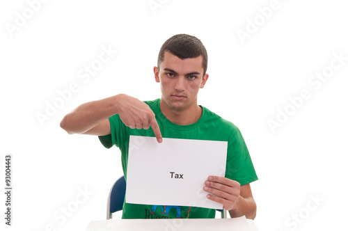 Handsome young man holding white frame with TAX text and pointin photo