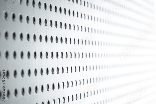 Galvanized perforated steel. Pegboard.

 photo