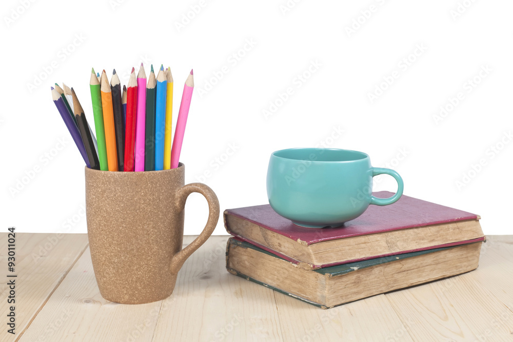 color pencils, coffee cup on wooden table color pencils, coffee cup on wooden table