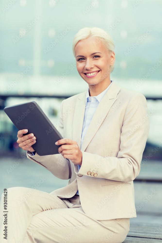 smiling businesswoman with tablet pc outdoors smiling businesswoman with tablet pc outdoors