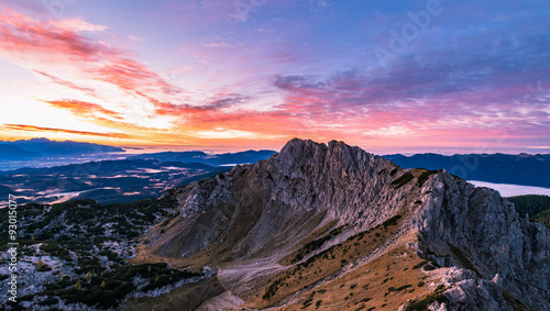 Sunrise in the mountains. Early morning as viewed from the top of Visevnik hill with vast landscape below.