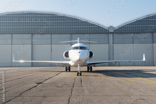 Business jet plane on the ground.