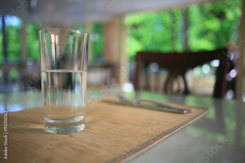 glass of water on a table in a restaurant
