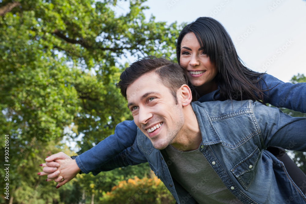 Fototapeta premium young couple playing flying