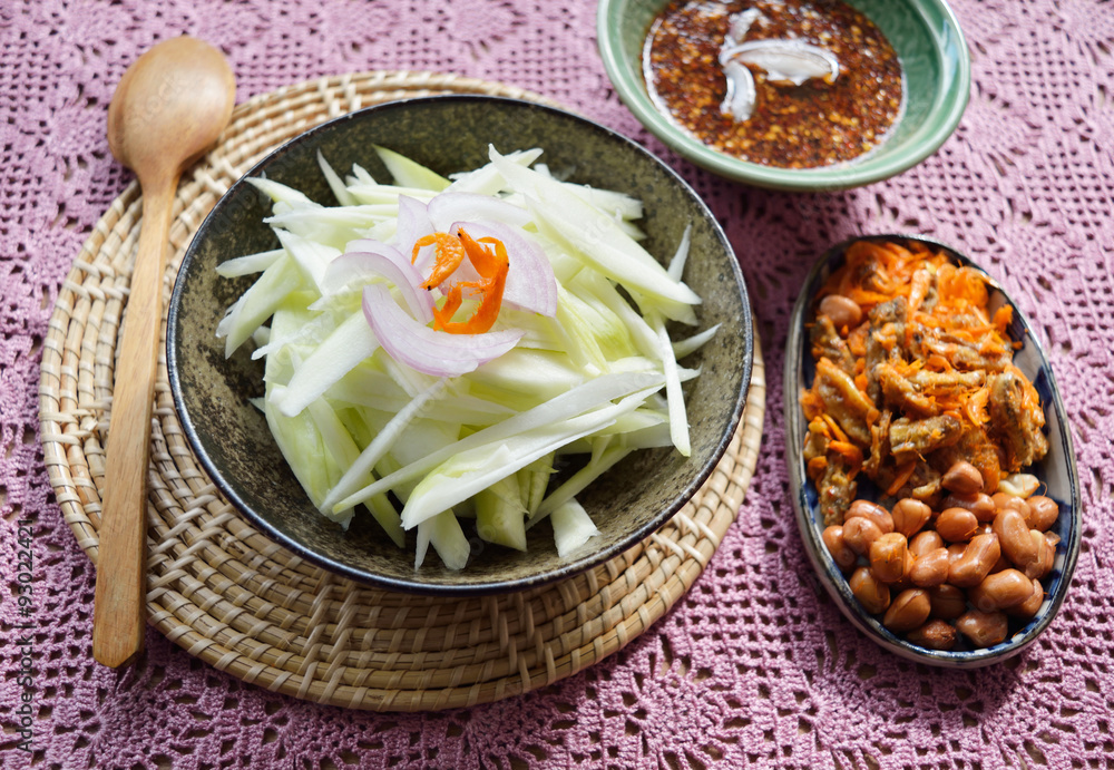 Mango salad with spicy shrimp paste sauce, Thai cuisine Mango salad with spicy shrimp paste sauce, Thai cuisine