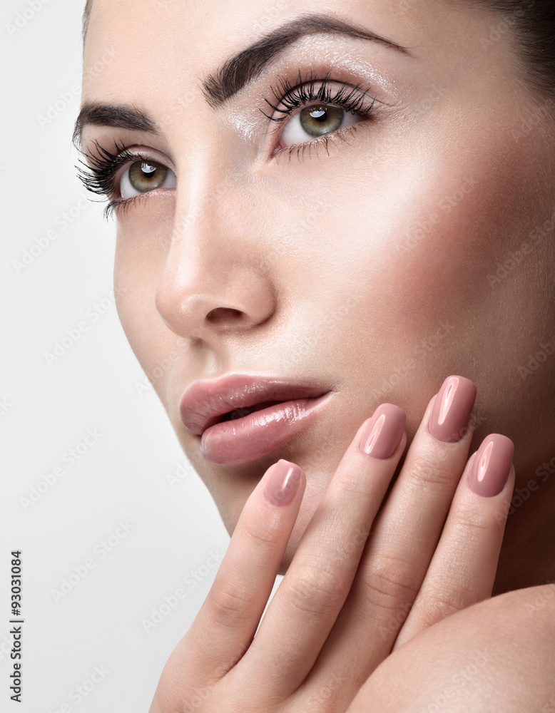 Fototapeta premium Beautiful Young Woman with Clean Fresh Skin. Close up Portrait.