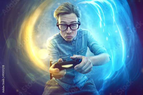 Nerdy gamer with controller photo