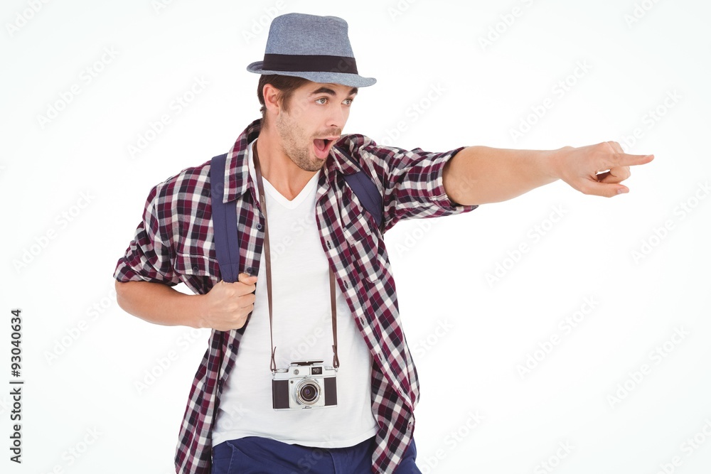 Surprised man with backpack pointing Surprised man with backpack pointing