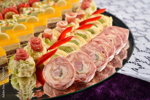 Close up of antipasto and catering platter with different appeti photo