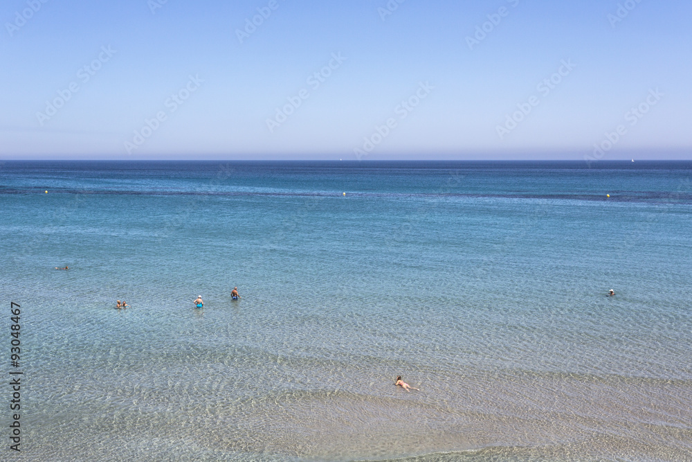 Bathing in bright sea. La Manga, Cartagena, Región de Murcia, Spain