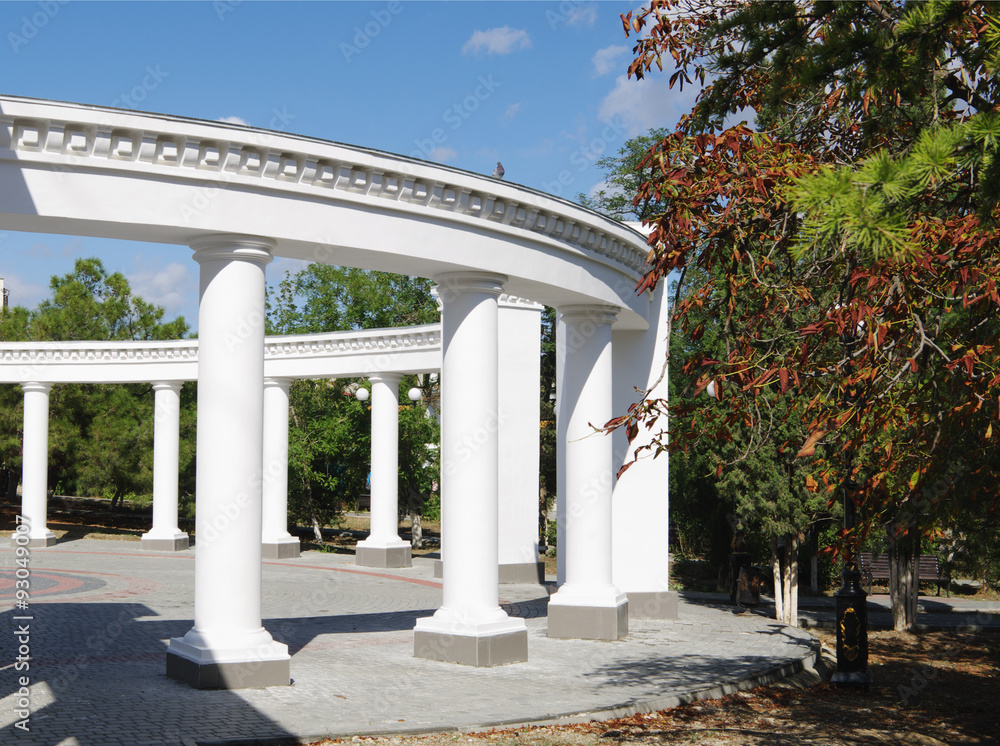 entrance to city park, round  white colonnade in antique style, Sudak, Crimea, Russia