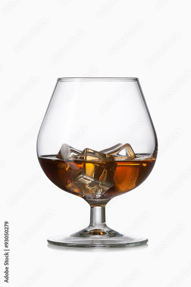 Glass. Whiskey with ice in glass isolated on white background Glass. Whiskey with ice in glass isolated on white background