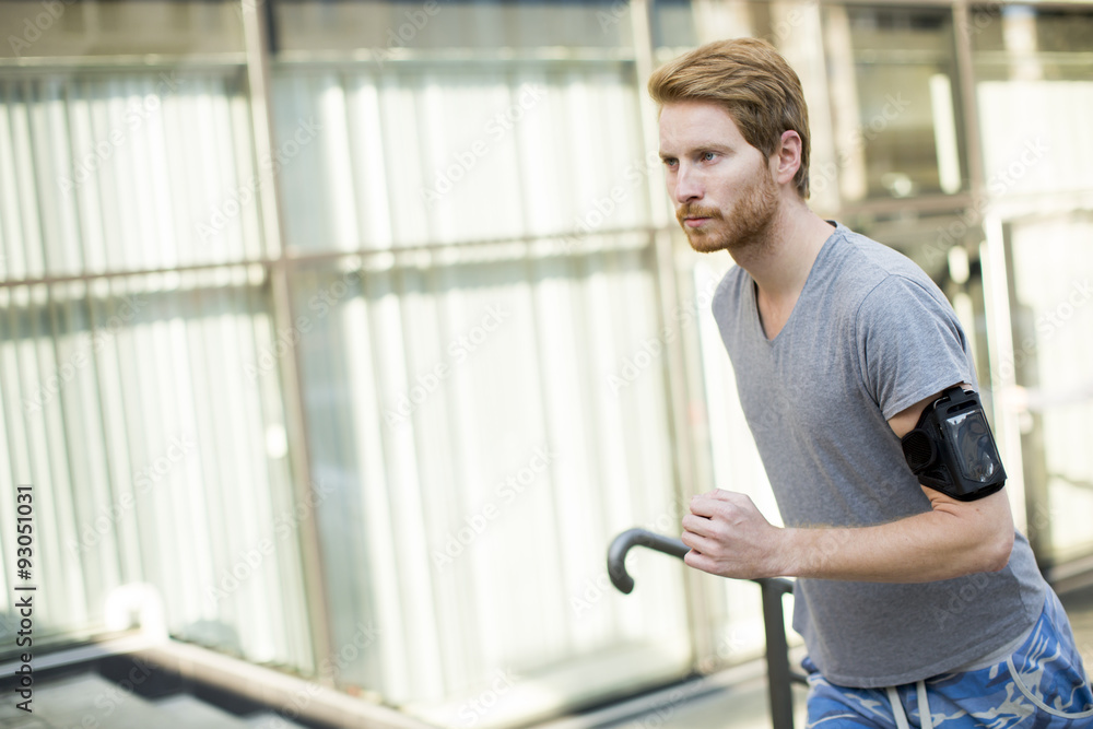 Young man running in the urban area Young man running in the urban area