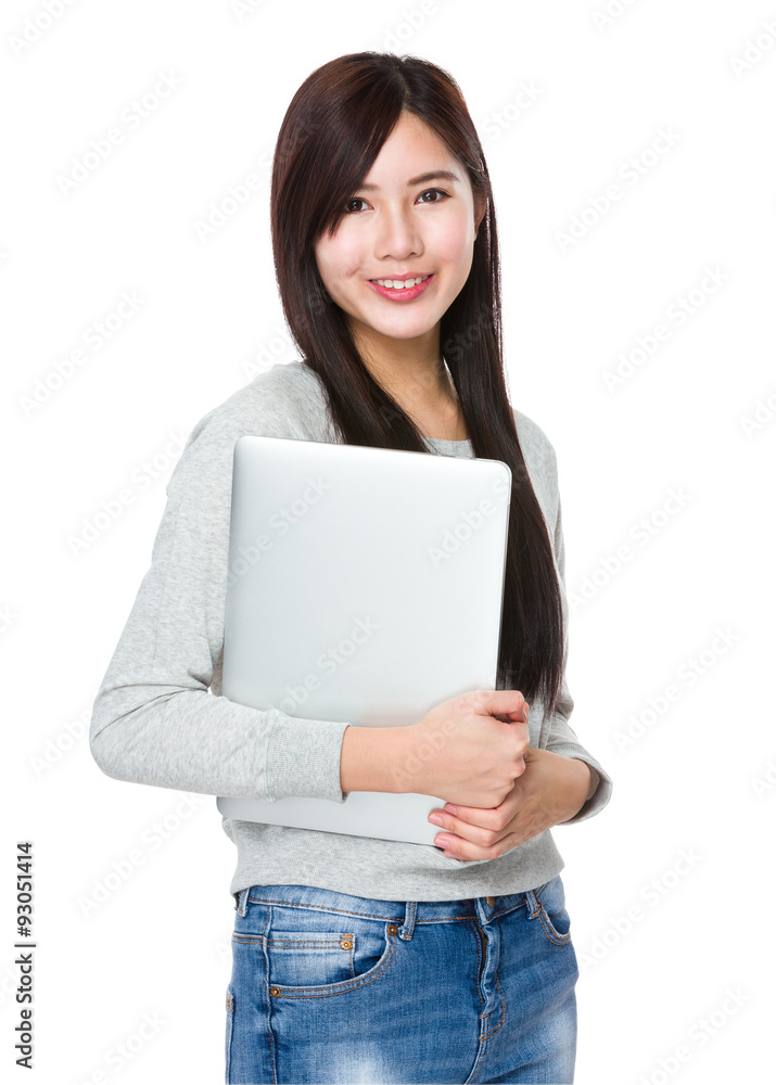 Asian Young woman hold with notebook computer Asian Young woman hold with notebook computer