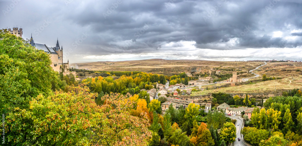 Naklejka premium Segovia Castle with dramatic cloudscape, Castilla y Leon, Spain