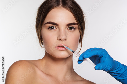 Cosmetic botox injection to woman s face