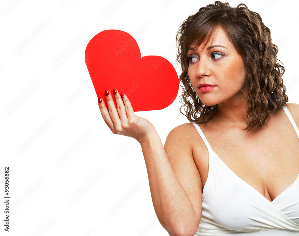 Young woman holding red paper heart Young woman holding red paper heart