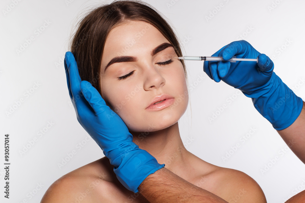 Cosmetic antiwrinkle injection to woman's face Cosmetic antiwrinkle injection to woman's face