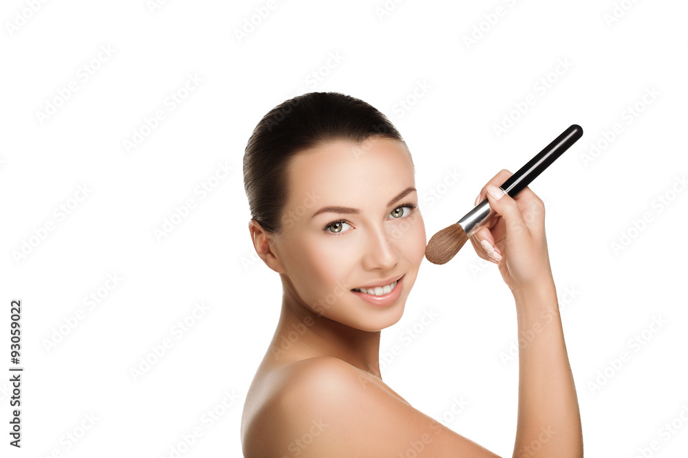 young beautiful brunette woman with nude makeup smile and hold brush at face. naturalness isolated photo. young beautiful brunette woman with nude makeup smile and hold brush at face. naturalness isolated photo.
