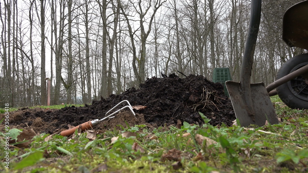 Gardener farmer unload wheelbarrow barrow with organic compost humus on vegetable bed. Soil prepare for plants in spring season. Agriculture works in garden farm. 4K UHD video clip.
Gardener farmer unload wheelbarrow barrow with organic compost humus on vegetable bed. Soil prepare for plants in spring season. Agriculture works in garden farm. 4K UHD video clip.