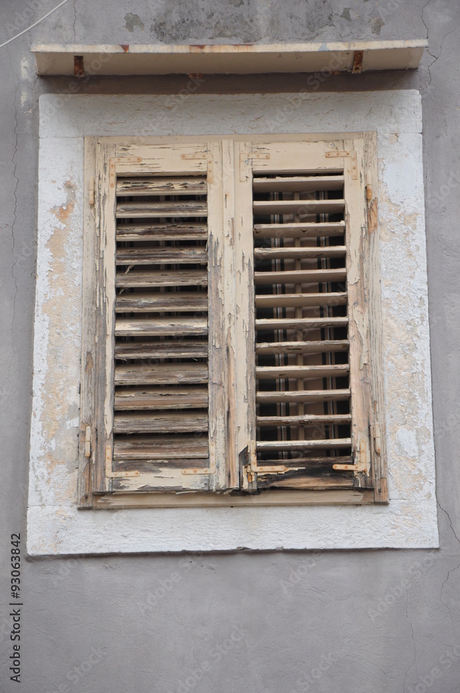 Window with old wooden shutters