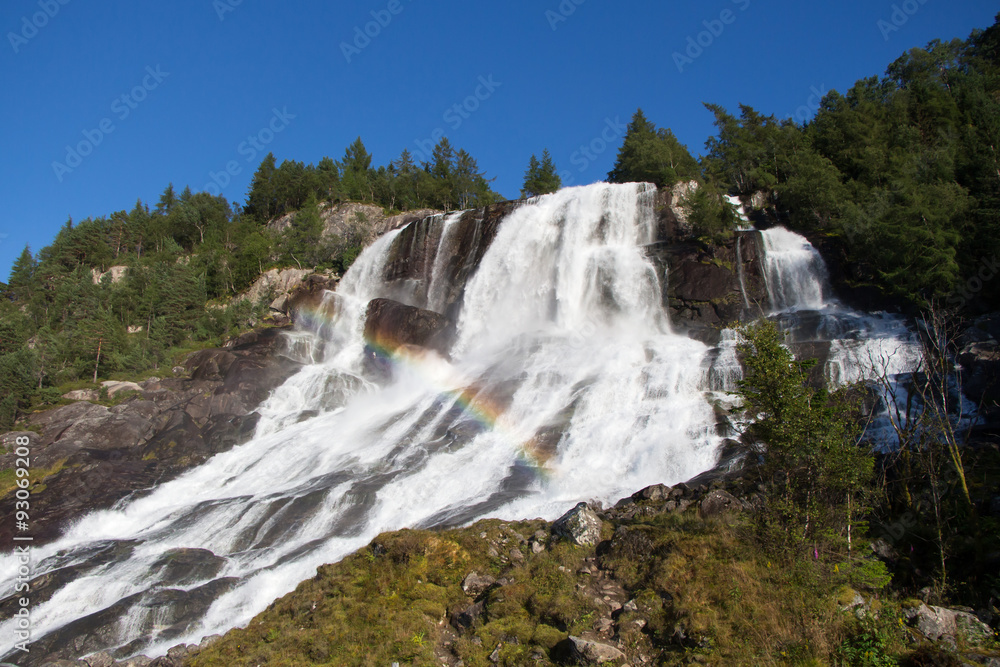 Obraz premium Waterfall with rainbow in norway