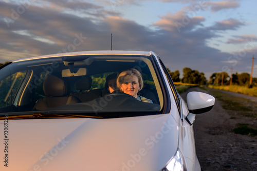 Woman driving at night on a country road © Daddy Cool