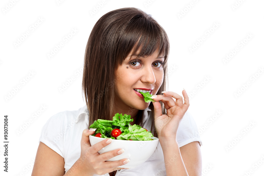 Young woman eating fresh salad Young woman eating fresh salad