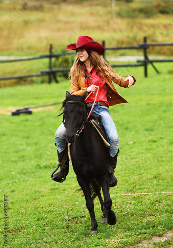 Girl barrel racing