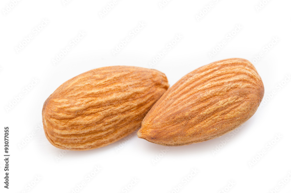 Close up almonds isolated on the white Close up almonds isolated on the white