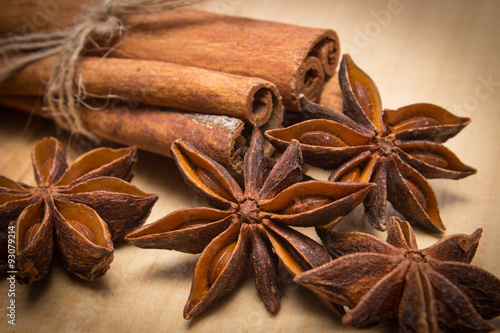 Cinnamon sticks and anise on wooden table, seasoning for cooking