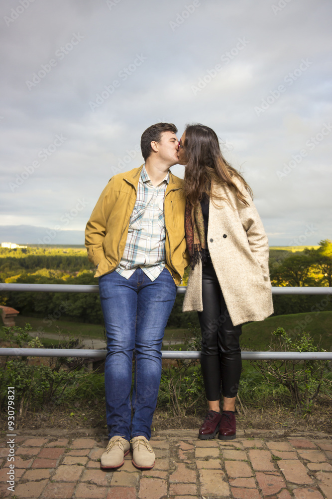 Fototapeta premium Young couple intimate standing next to each other.