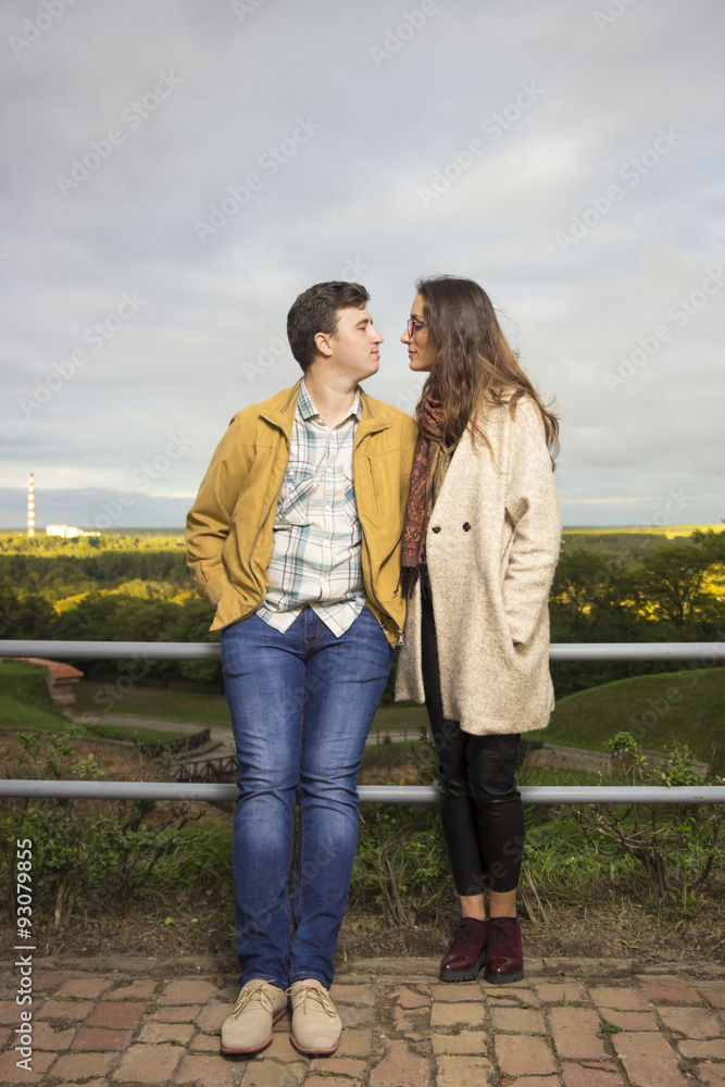 Young couple intimate standing next to each other. Young couple intimate standing next to each other.