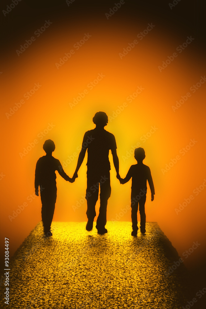 silhouettes of children and adult are on the road ahead