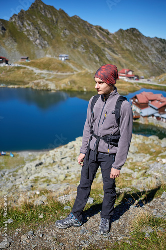 Hiker boy by the lake