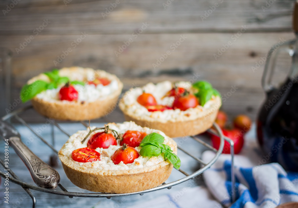 sand tarts with goat cheese and cherry tomatoes, vegetarian food sand tarts with goat cheese and cherry tomatoes, vegetarian food