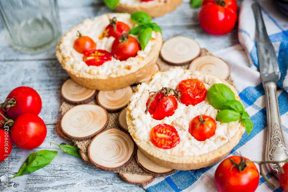 sand tarts with goat cheese and cherry tomatoes, vegetarian food sand tarts with goat cheese and cherry tomatoes, vegetarian food