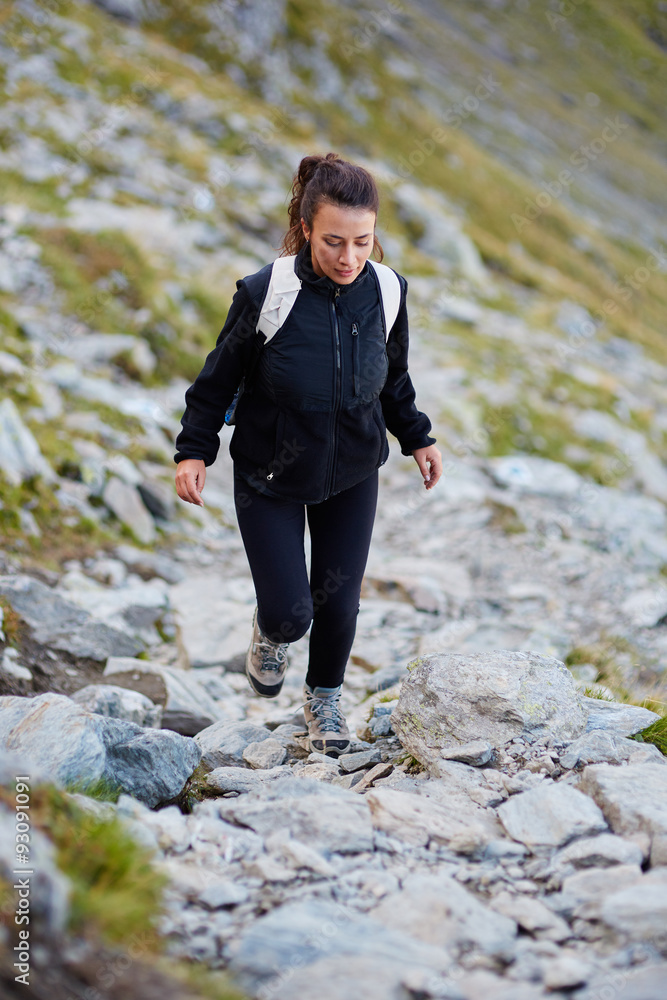 Woman hiker on a trail