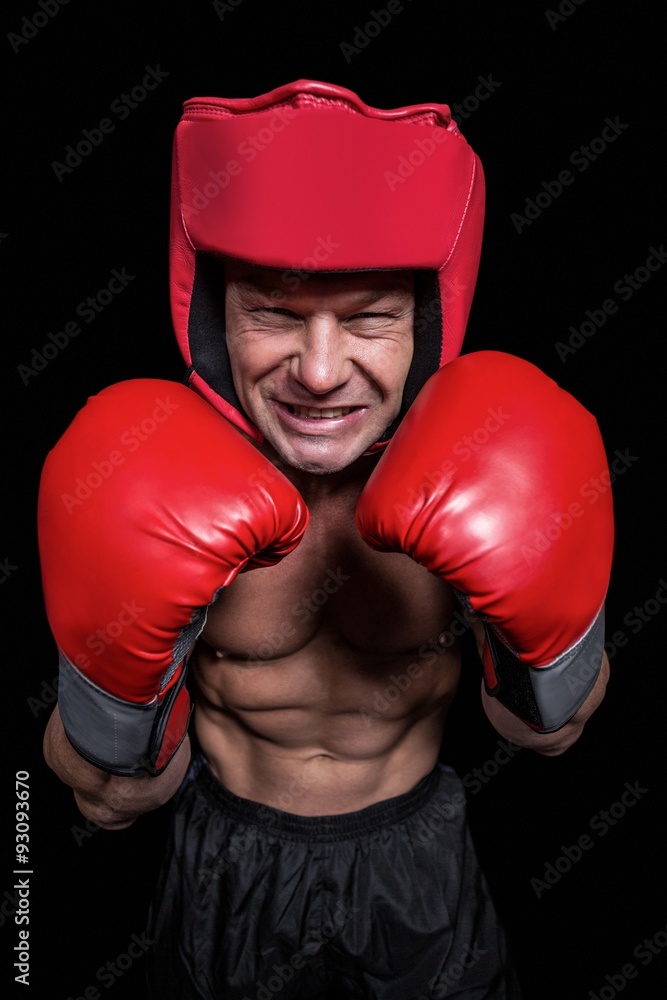 Angry boxer with gloves and headgear